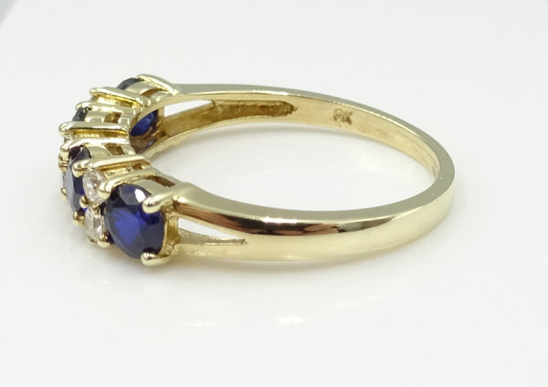 9ct gold CZ and synthetic Sapphire 1/2 eternity ring. 2.4gr