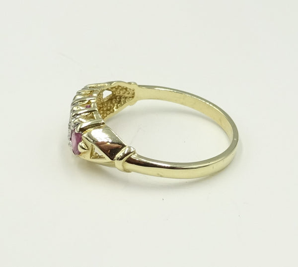 9ct gold Ruby and Diamond boat ring. 1.85gr