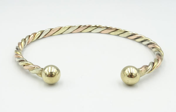 9ct 3 colour twist torque bangle. 15.2gr