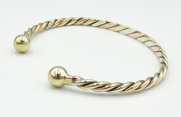 9ct 3 colour twist torque bangle. 15.2gr