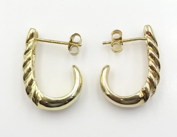 9ct gold diamond set 'J' shape earrings. 0.50ct total. 4.67gr